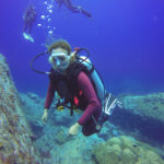 underwater-scuba-diving-selfie-shot-with-selfie-stick-deep-blue-sea-wide-angle-shot